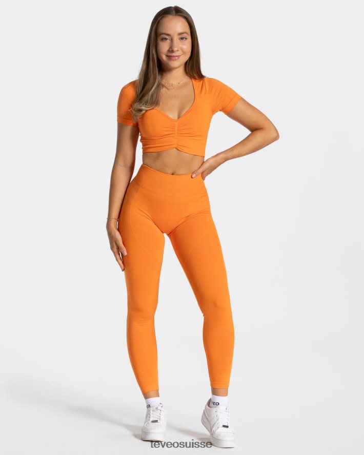 vêtements femmes TEVEO 40204P457 haut court de mise au point orange